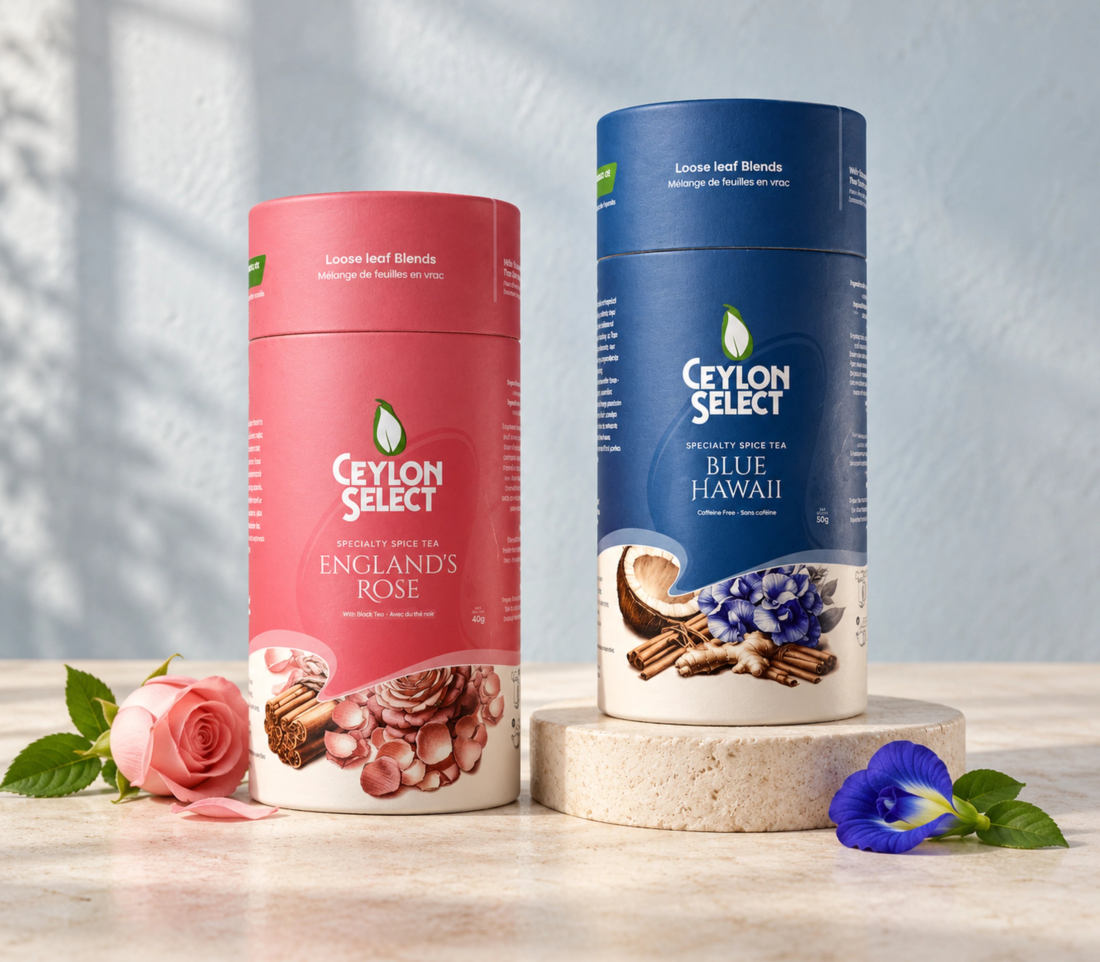 Pink England’s Rose and blue Blue Hawaii canisters on ivory stone